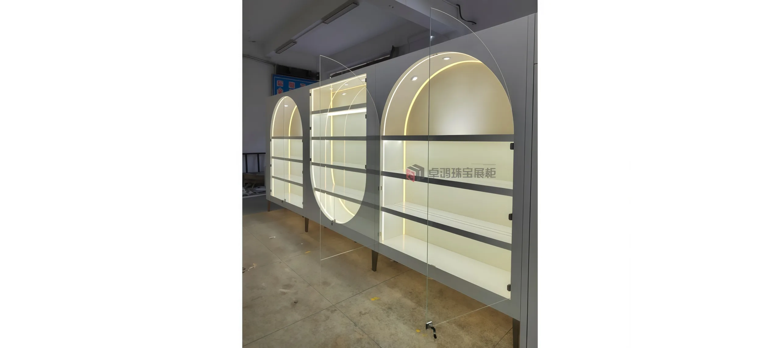 Minimalist Curved Display Cabinets | Custom for Bags & Apparel